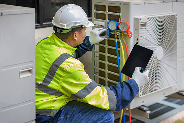 Professional Air Conditioning Repair technician working in River Edge, NJ
